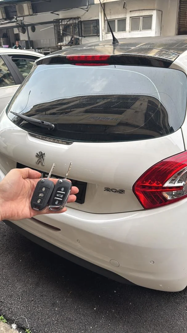 Programming a BMW smart key remote fob via OBD scanner
